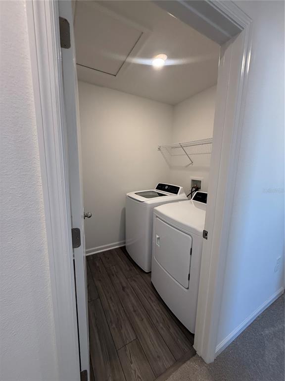 4701 Southwest 83rd Loop Ocala, FL 34476 - Photo 14 of 17 a utility room with wooden floor washer and dryer
