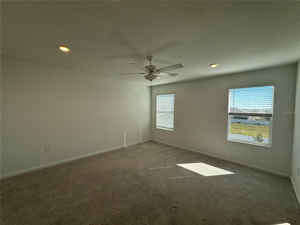 4701 Southwest 83rd Loop Ocala, FL 34476 - Photo 6 of 17 an empty room with a window