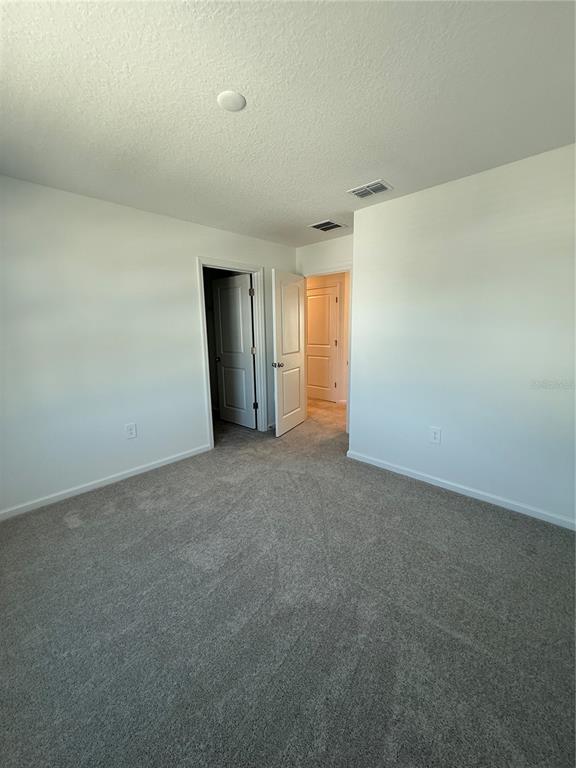 4701 Southwest 83rd Loop Ocala, FL 34476 - Photo 10 of 17 a view of an empty room and closet