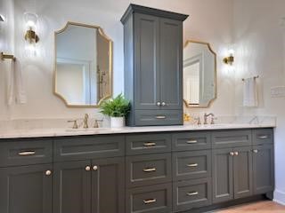 1535 Rutland Street Houston, TX 77008 - Photo 26 of 46 In keeping with the Victorian era, the dark bespoke cabinets provide the vintage feel and together, with the glass wall sconces, the champagne trimmed mirrors and the double vanity, complete the most elegant primary bathroom oasis.