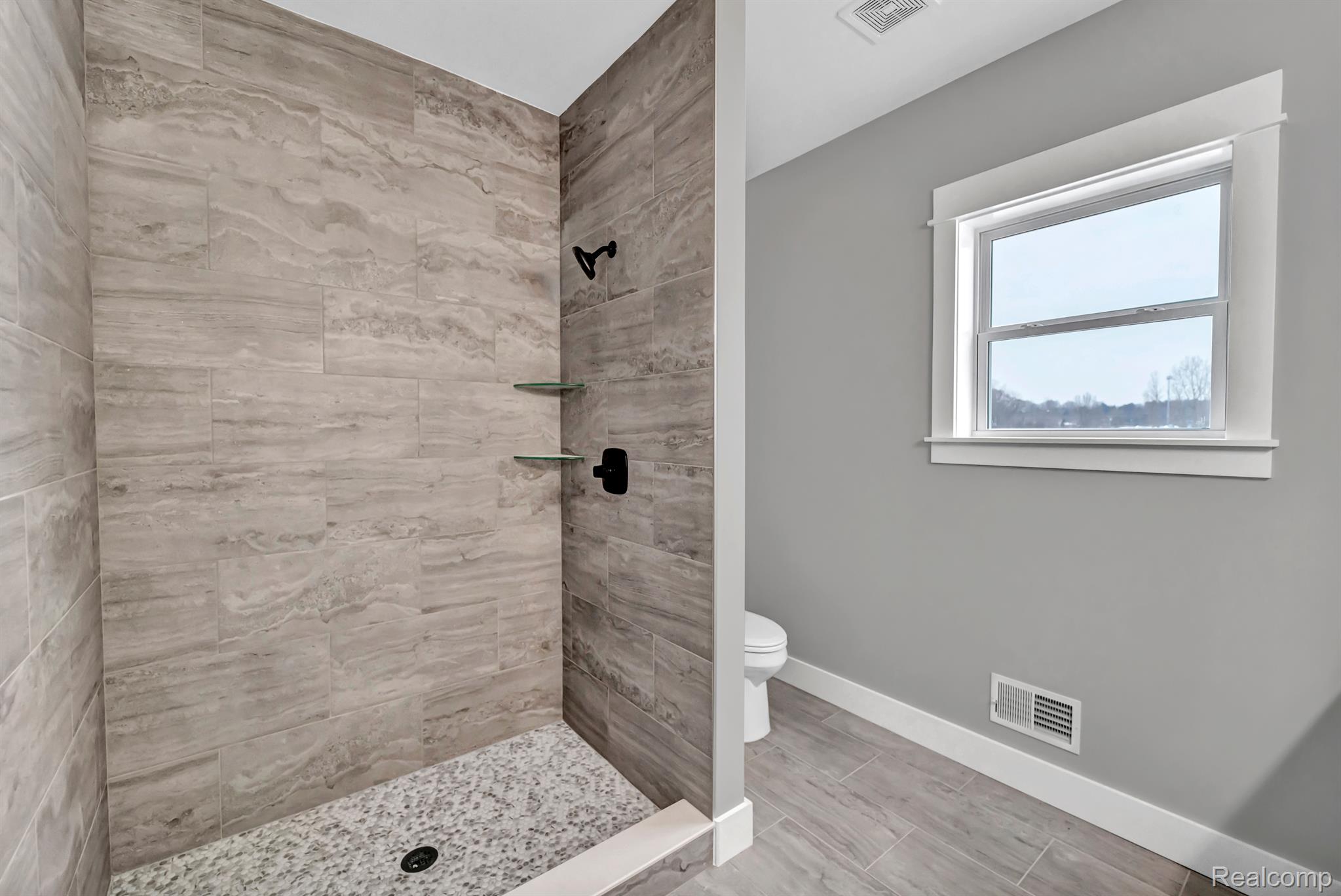 4595 Imlay City Road Attica, MI 48412 - Photo 9 of 13 Large walk-in shower in primary bath