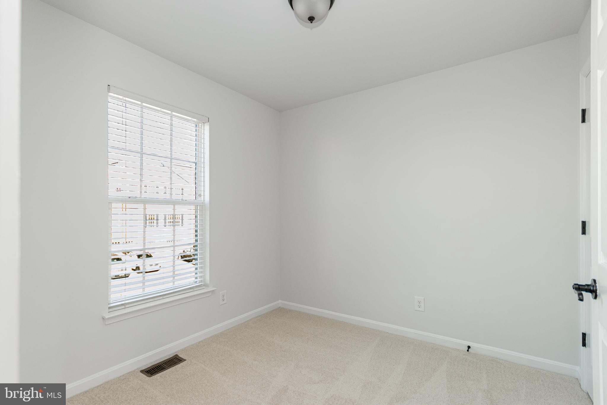 4905 Wensel Road Fredericksburg, VA 22408 - Photo 12 of 23 an empty room with windows
