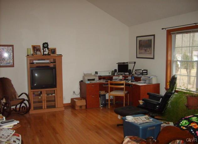 1533 Donaldson Road Cresco, PA 18326 - Photo 4 of 6 a view of a workspace with furniture and a window