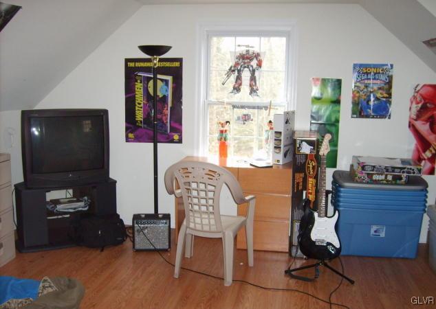 1533 Donaldson Road Cresco, PA 18326 - Photo 6 of 6 a living room with furniture and wooden floor
