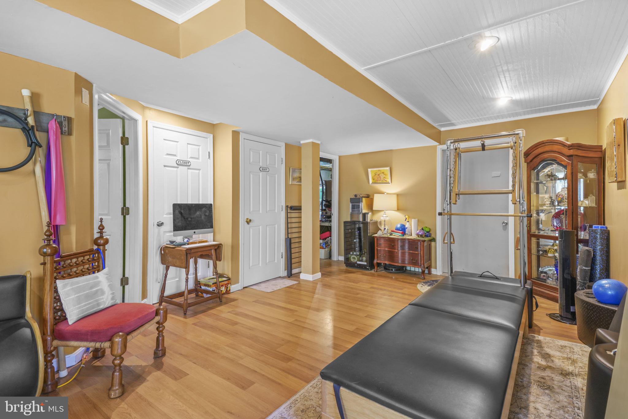 90 Park Avenue Edgewater, MD 21037 - Photo 31 of 44 a living room with furniture a flat screen tv and a large window