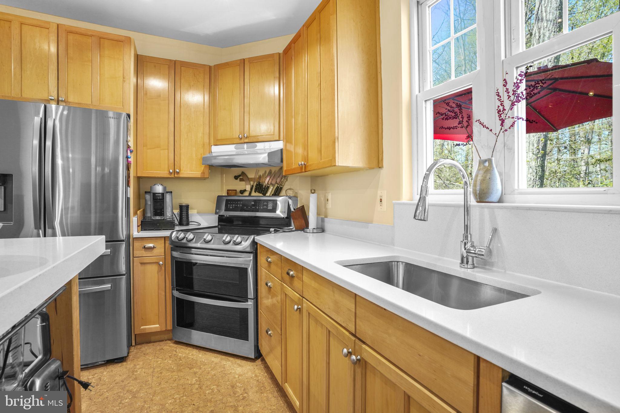 90 Park Avenue Edgewater, MD 21037 - Photo 7 of 44 a kitchen with a sink stove and refrigerator