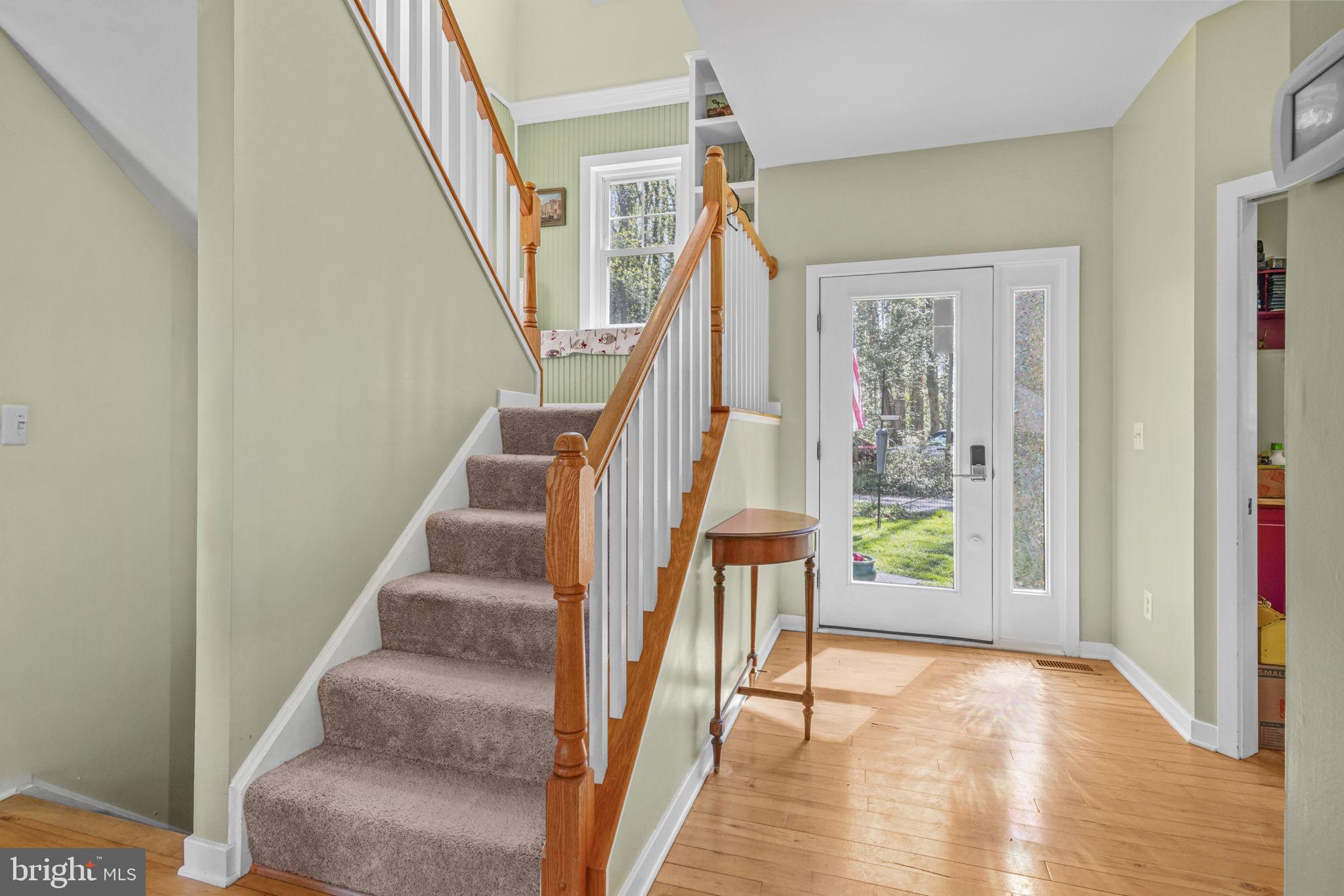 90 Park Avenue Edgewater, MD 21037 - Photo 9 of 44 a view of entryway with wooden floor and stair