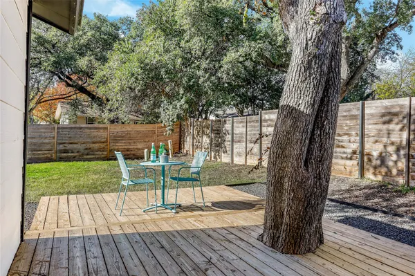 a view of an outdoor sitting area with swimming pool