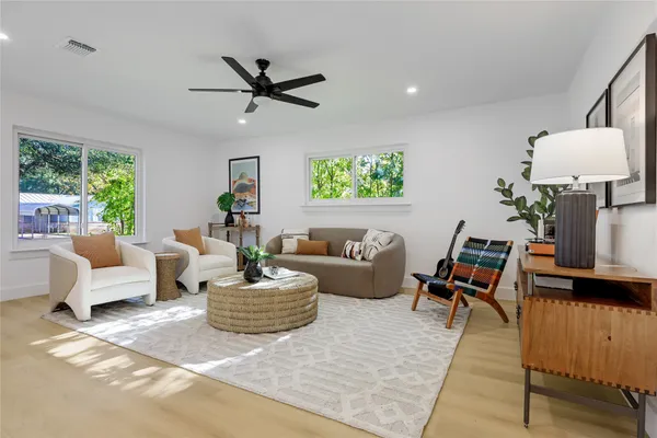 a living room with furniture and a window