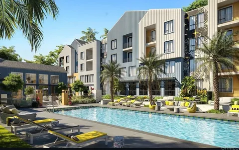 a view of a building with a swimming pool