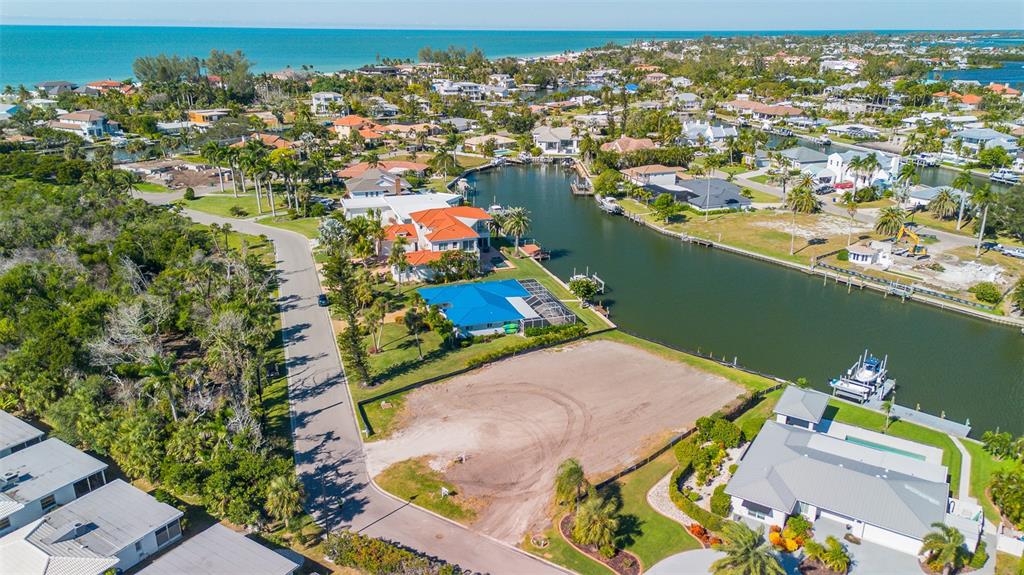 721 Binnacle Point Drive Longboat Key, FL 34228 - Photo 5 of 12 an aerial view of a house with a ocean view