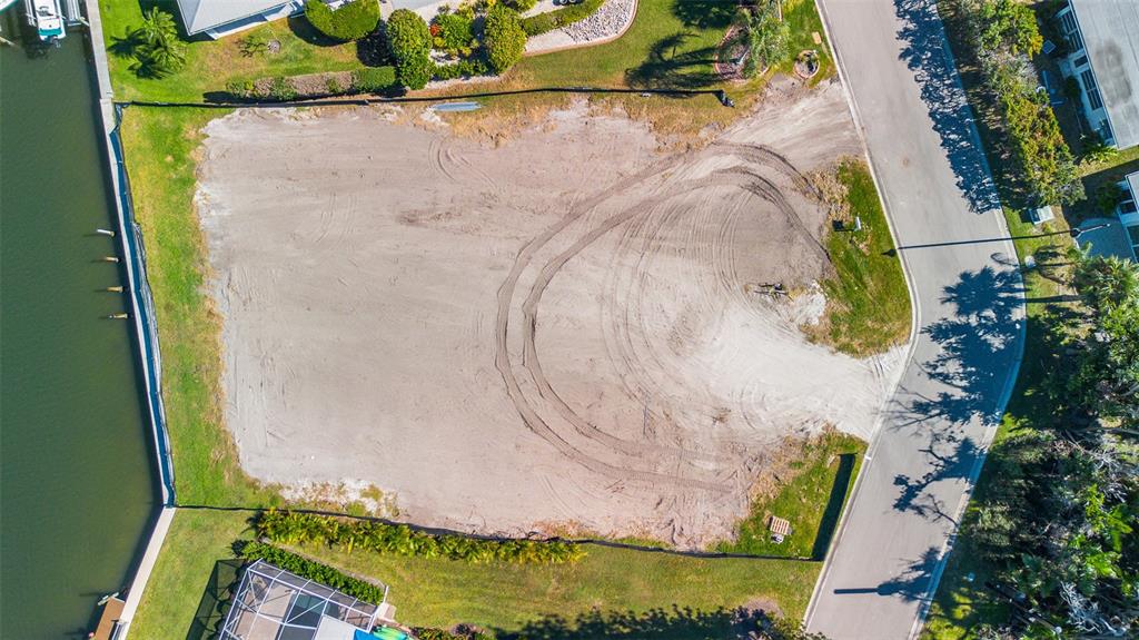 721 Binnacle Point Drive Longboat Key, FL 34228 - Photo 6 of 12 an aerial view of a swimming pool