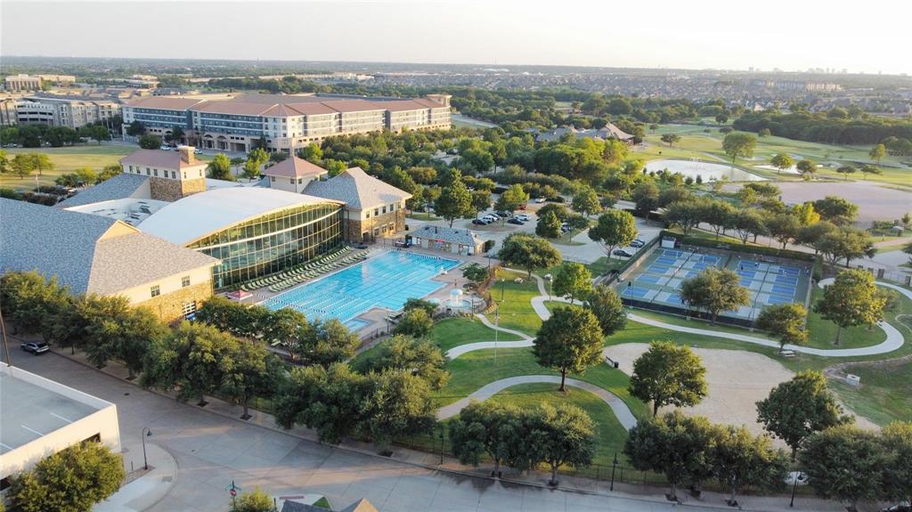 7605 Kickapoo Drive McKinney, TX 75070 - Photo 16 of 18 an aerial view of a house with a lake view