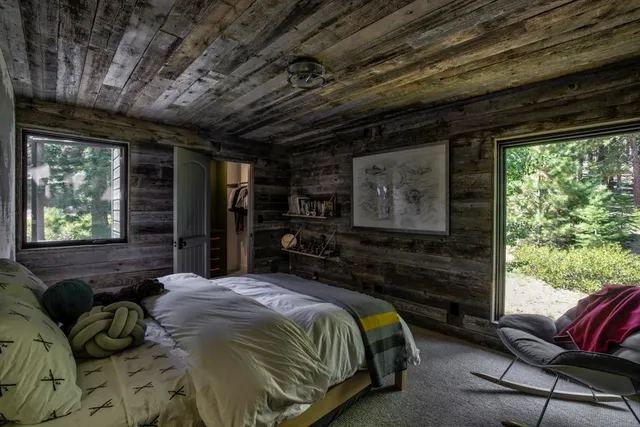 a black and white photo of a fireplace