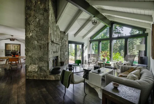 a view of a dining room with furniture and window
