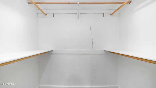 a view of a room with racks on the wall