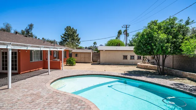a front view of house with yard and seating area