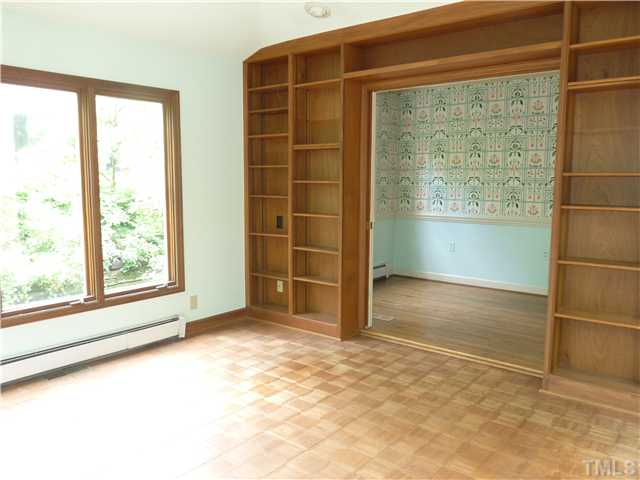 1612 Jarvis Street Raleigh, NC 27608 - Photo 7 of 25 an empty room with windows