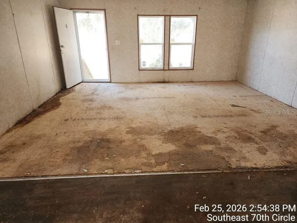 an empty room with a window