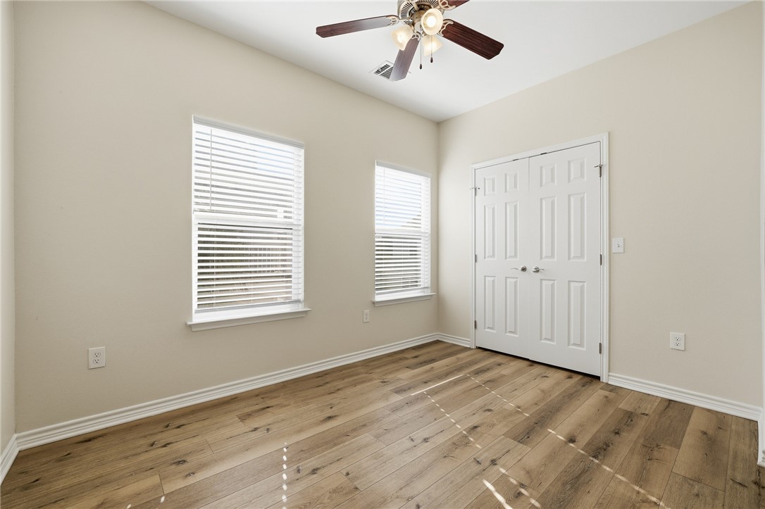 124 Lavaca Rockport, TX 78382 - Photo 18 of 39 a view of an empty room with a window
