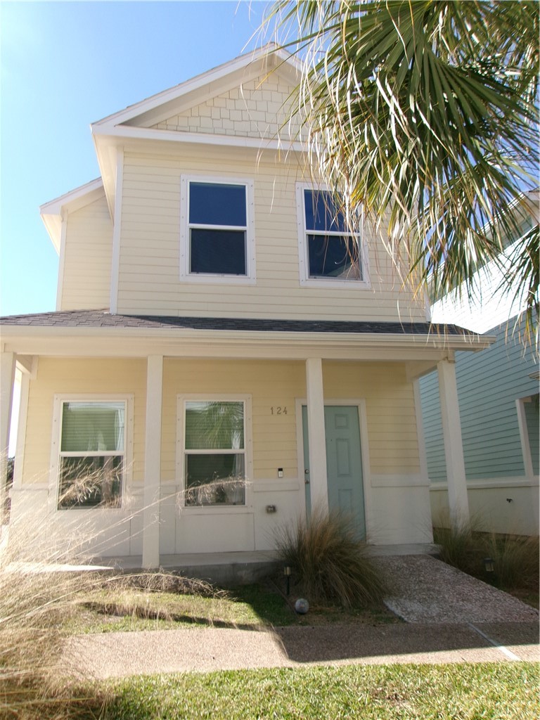 124 Lavaca Rockport, TX 78382 - Photo 2 of 39 a front view of a house