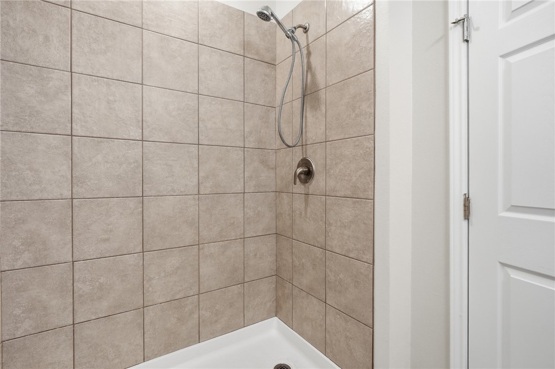 124 Lavaca Rockport, TX 78382 - Photo 25 of 39 a bathroom with a shower
