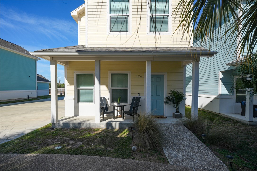 124 Lavaca Rockport, TX 78382 - Photo 27 of 39 a front view of a house with a porch