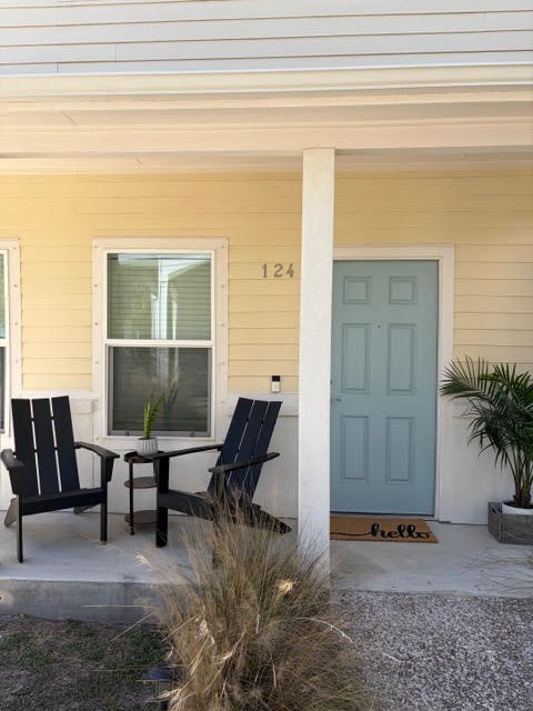 124 Lavaca Rockport, TX 78382 - Photo 3 of 39 a view of workspace with furniture and window