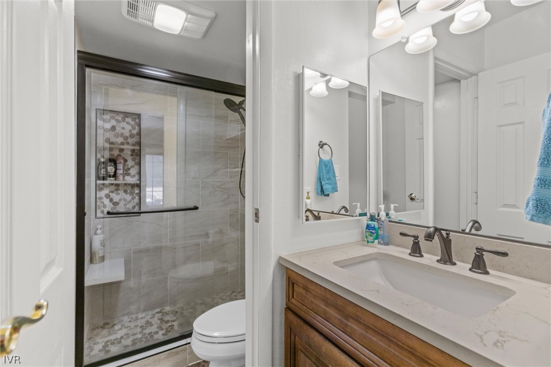 321 Ski Way, Unit 13 Incline Village, NV 89451 - Photo 12 of 26 a bathroom with a granite countertop sink mirror toilet and shower