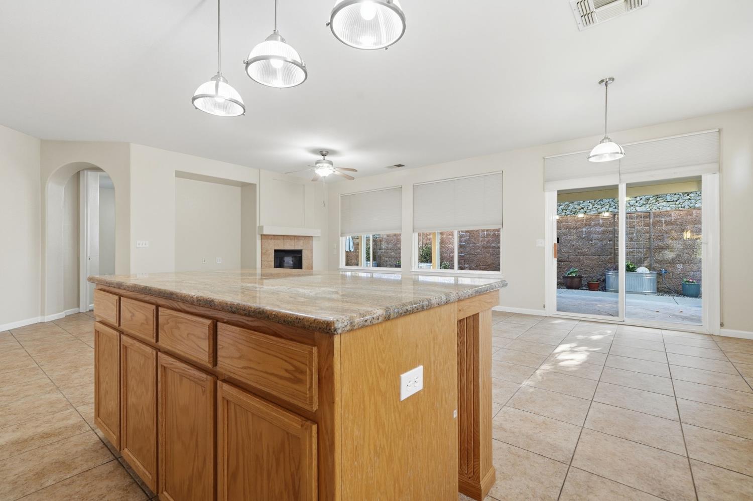 818 Alpine Street Jackson, CA 95642 - Photo 15 of 32 a kitchen with a sink and a refrigerator