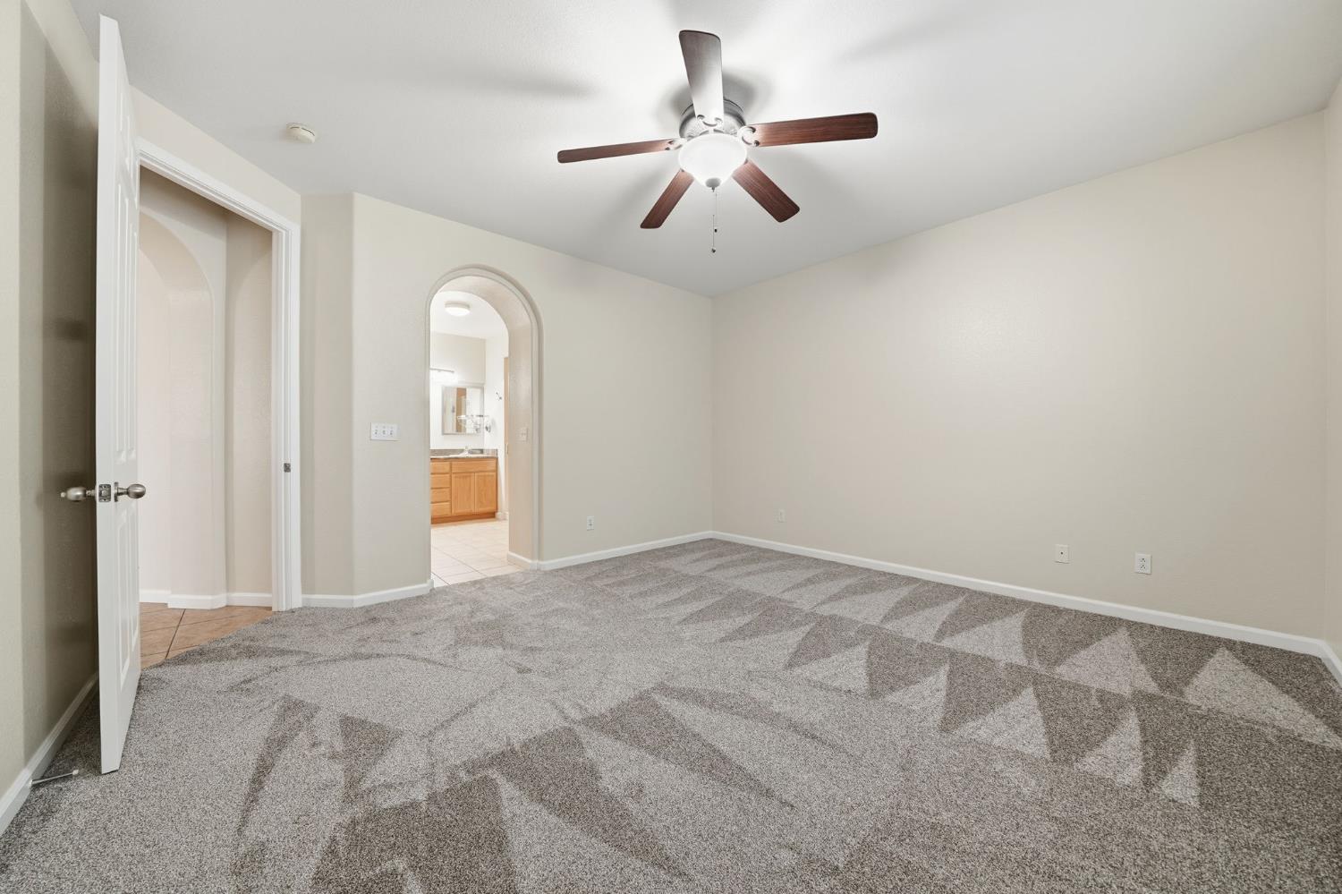 818 Alpine Street Jackson, CA 95642 - Photo 18 of 32 a view of a big room with closet and ceiling fan