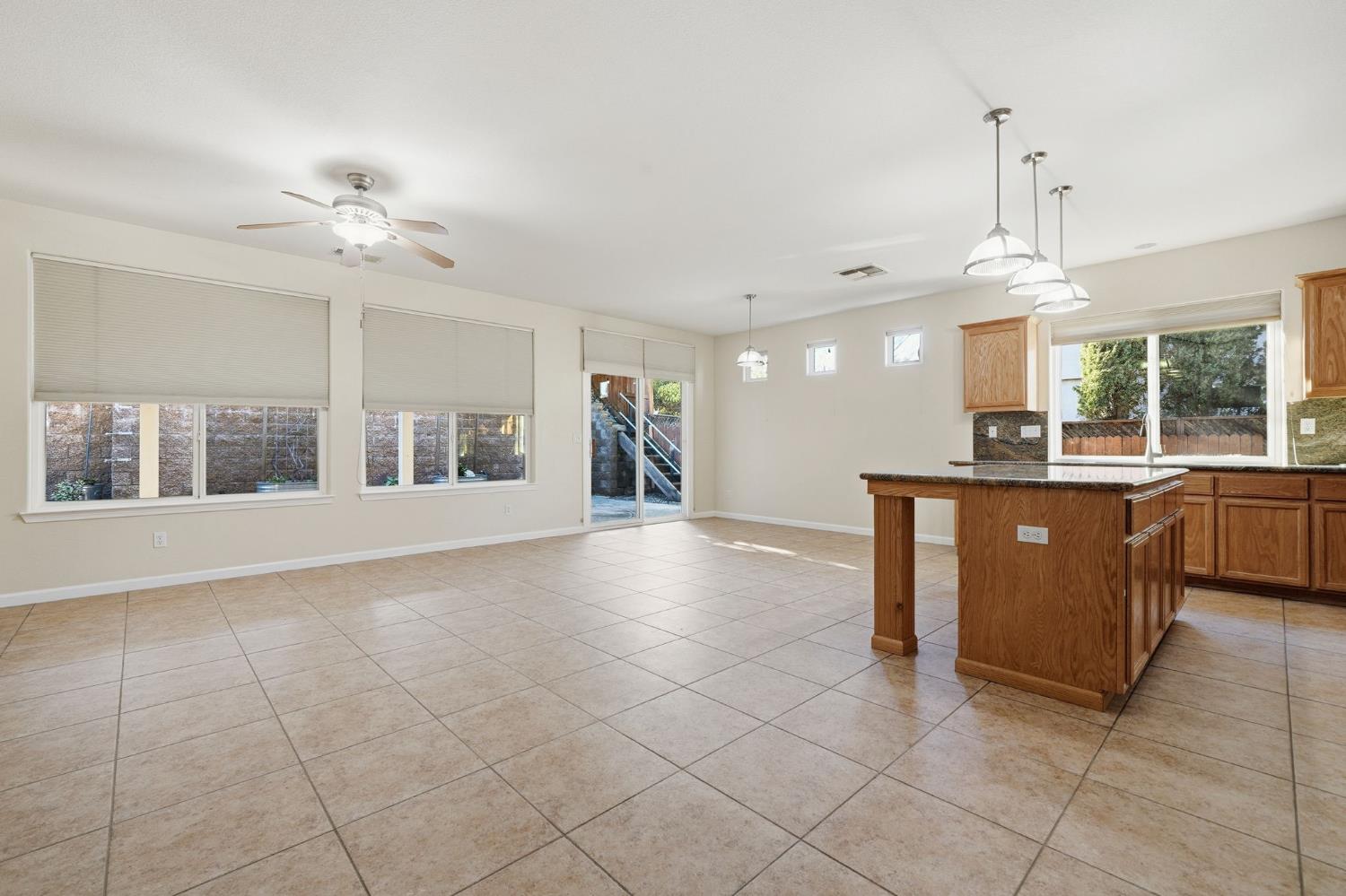 818 Alpine Street Jackson, CA 95642 - Photo 6 of 32 a view of a kitchen with cabinet and a chandelier