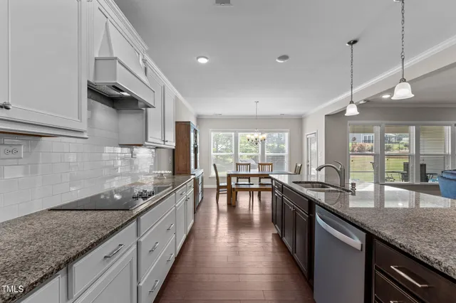 a kitchen with granite countertop lots of counter top space