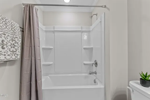 a view of a garage with rack and bicycle