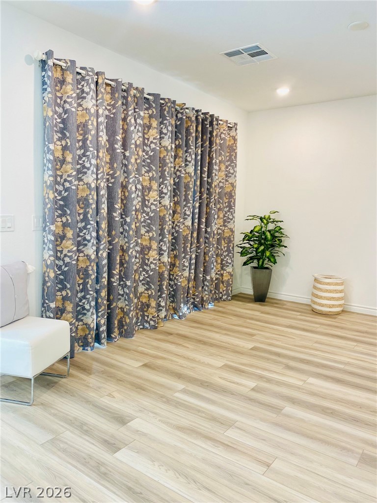 4457 Sawyer Ridge Street Las Vegas, NV 89147 - Photo 16 of 32 This bright space features natural light and durable flooring, ideal for versatile living.