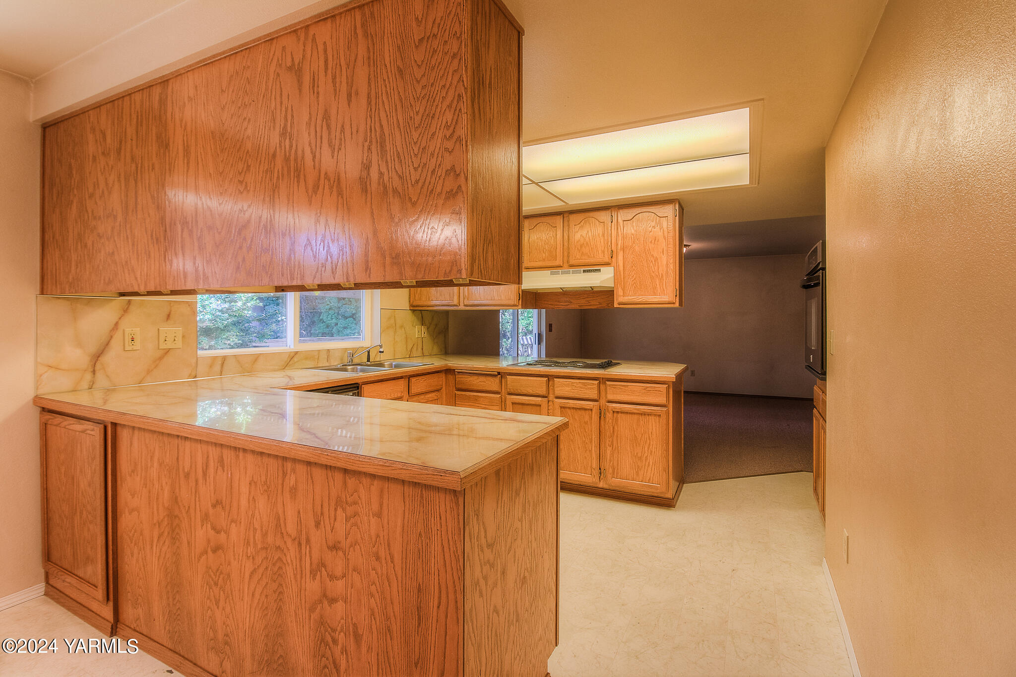 1729 Parsons Loop Yakima, WA 98908 - Photo 12 of 27 a bathroom with a sink and a mirror