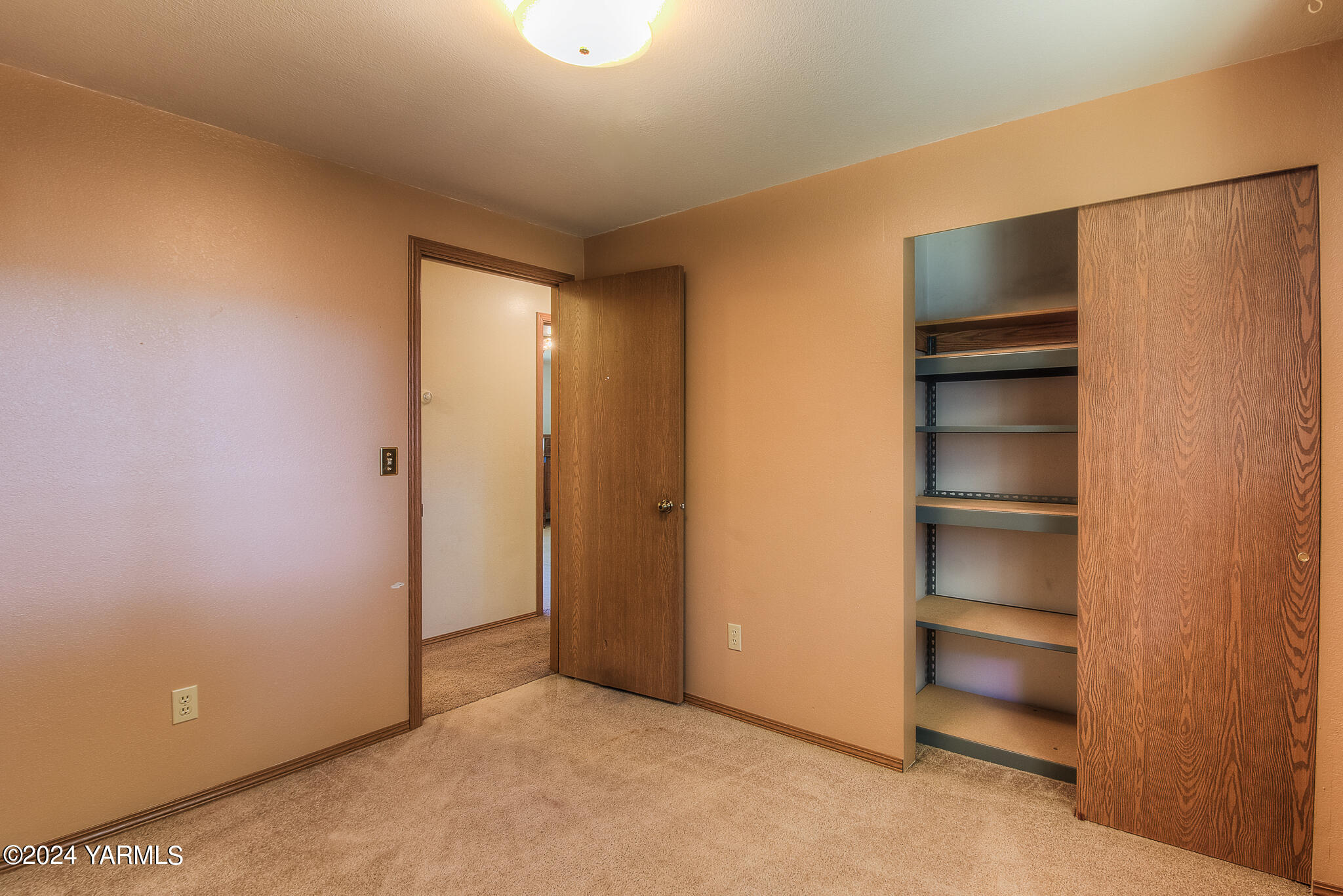1729 Parsons Loop Yakima, WA 98908 - Photo 16 of 27 a view of an empty room and a room