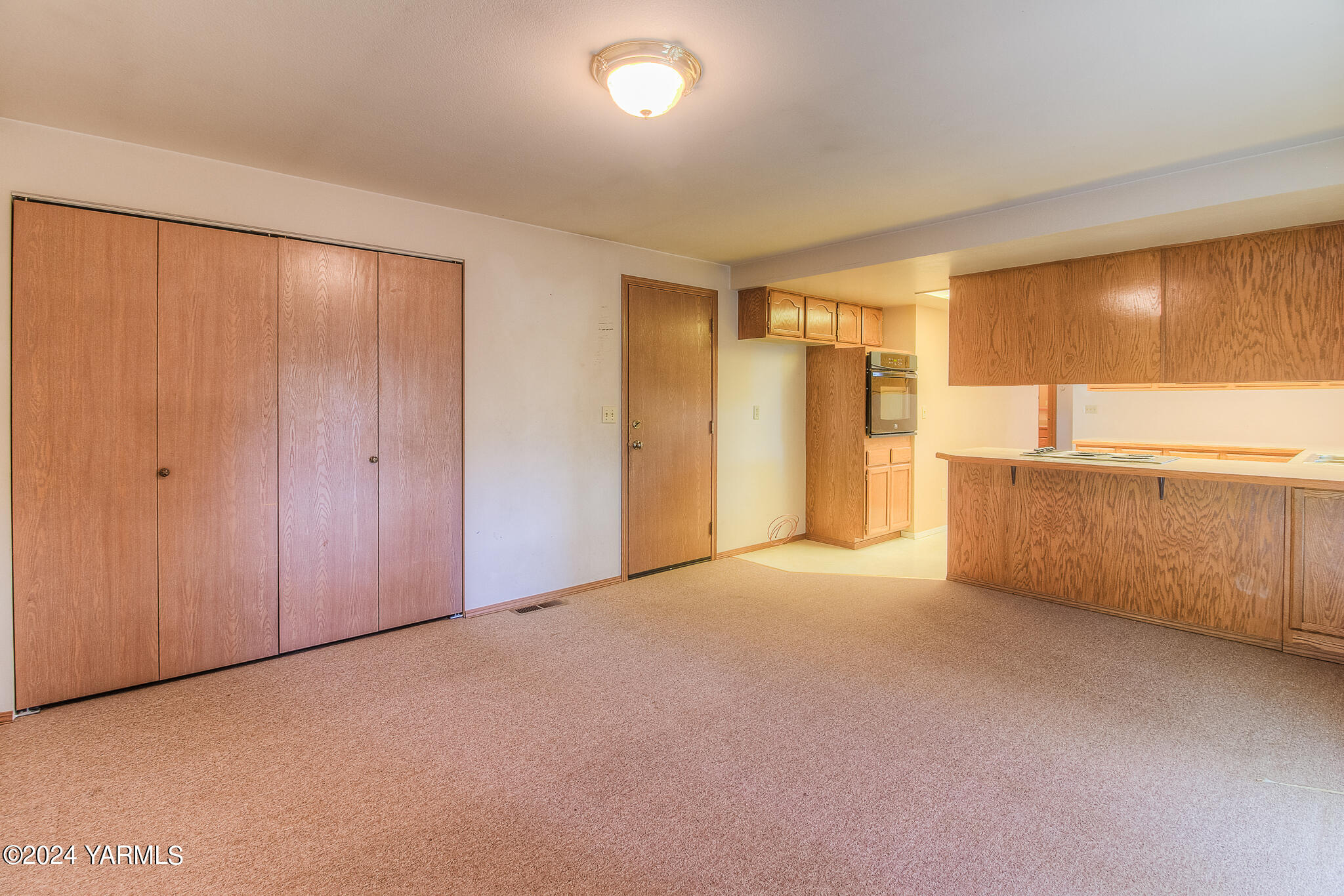 1729 Parsons Loop Yakima, WA 98908 - Photo 8 of 27 a view of an empty room with a window