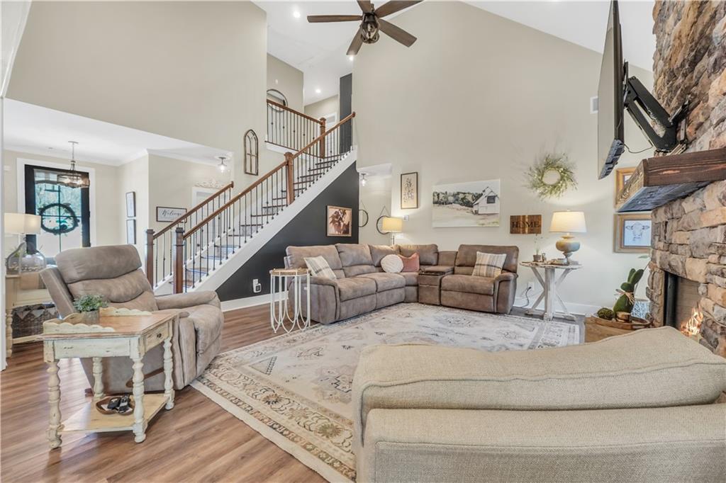 230 Alcovy Reserve Way Covington, GA 30014 - Photo 20 of 53 a living room with furniture and a fireplace