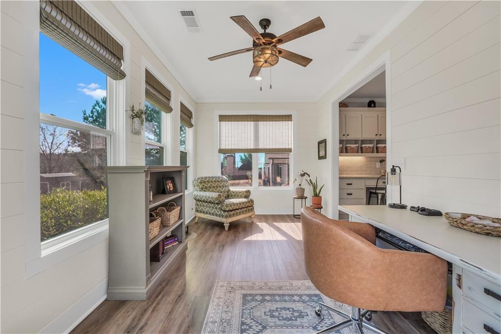 230 Alcovy Reserve Way Covington, GA 30014 - Photo 32 of 53 a living room with furniture a rug potted plant and a window