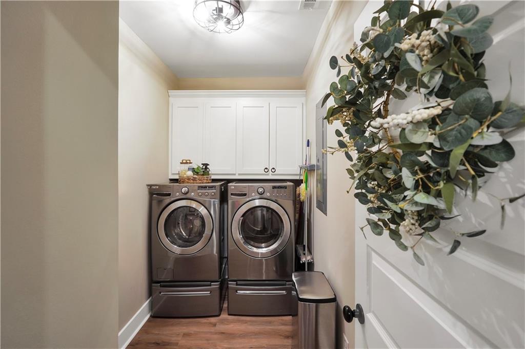 230 Alcovy Reserve Way Covington, GA 30014 - Photo 34 of 53 a utility room with dryer and washer