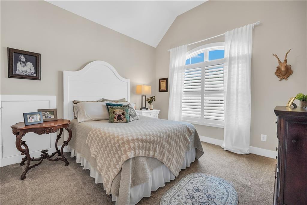 230 Alcovy Reserve Way Covington, GA 30014 - Photo 44 of 53 a bedroom with a bed and a table in it