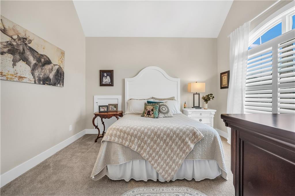 230 Alcovy Reserve Way Covington, GA 30014 - Photo 45 of 53 a bedroom with a bed and window