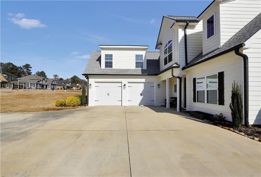 230 Alcovy Reserve Way Covington, GA 30014 - Photo 7 of 53 a house view with a outdoor space
