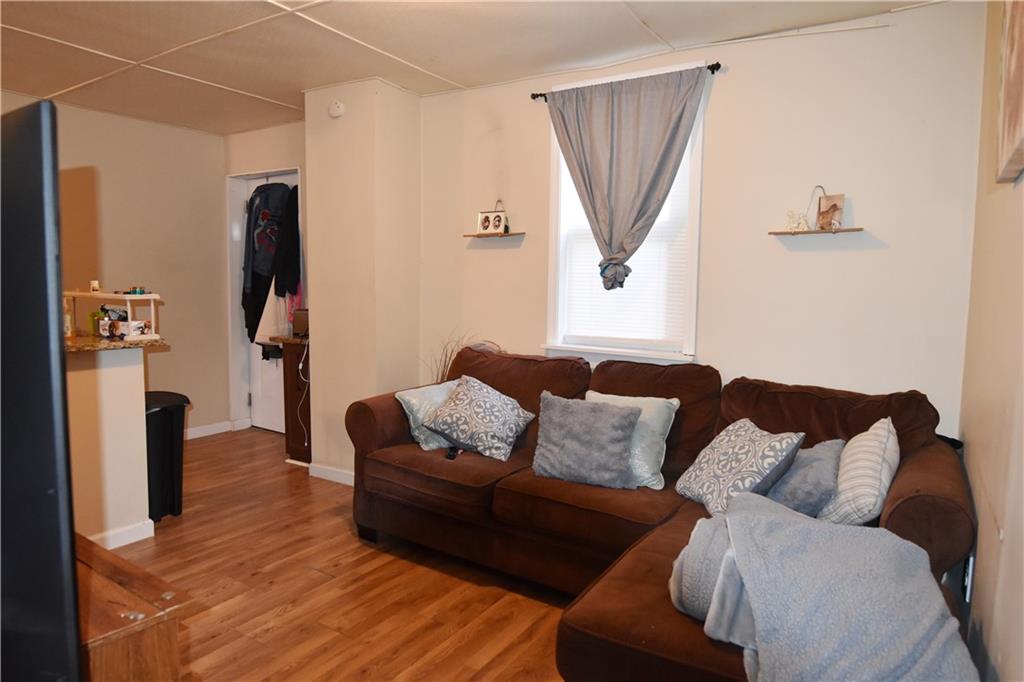 520 Brinton Avenue Trafford, PA 15085 - Photo 14 of 23 a living room with furniture and a window