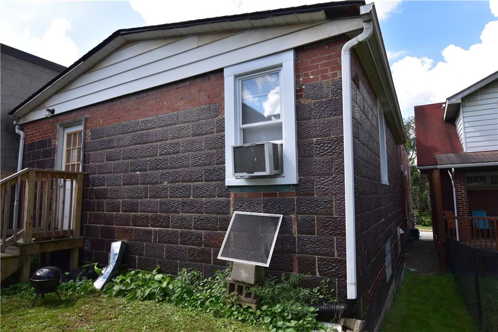 520 Brinton Avenue Trafford, PA 15085 - Photo 18 of 23 a front view of a house with garden