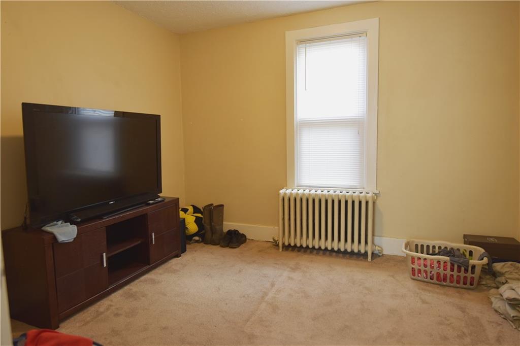 520 Brinton Avenue Trafford, PA 15085 - Photo 22 of 23 a livingroom with furniture and a window