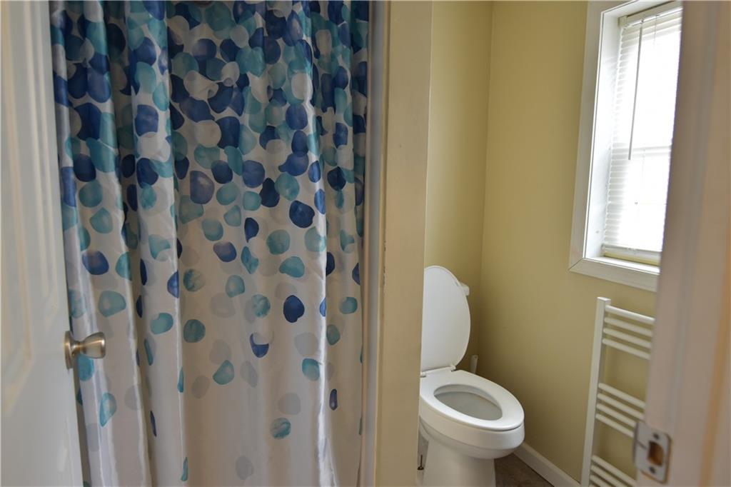 520 Brinton Avenue Trafford, PA 15085 - Photo 23 of 23 a white toilet sitting next to a small bathroom sink