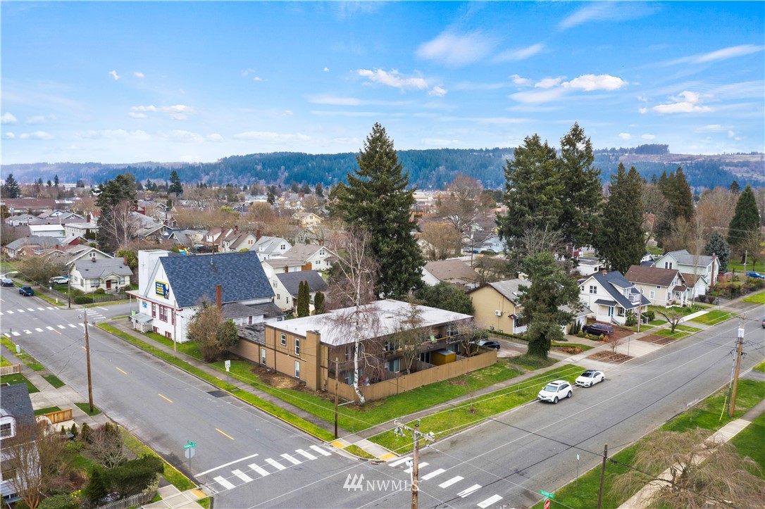 1103 Thompson Street Sumner, WA 98390 - Photo 26 of 29 a view of a city with tall buildings
