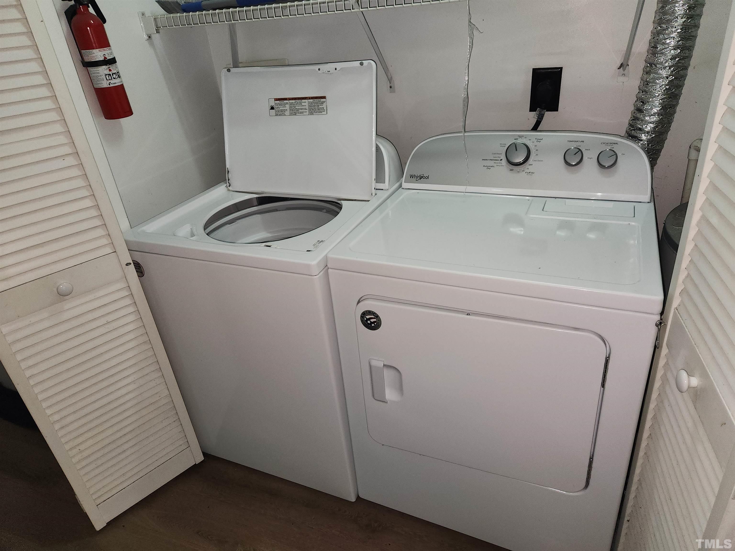 1440 Collegiate Circle, Unit 103 Raleigh, NC 27606 - Photo 7 of 10 a utility room with dryer and washer